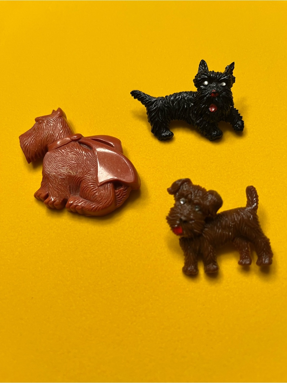 Three Terrier Celluloid and Bakelite Pins (1930-1950)